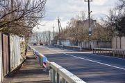Дорога по вулиці Олександрівській отримала новий асфальт, розмітку та відбійники - ФОТОРЕПОРТАЖ